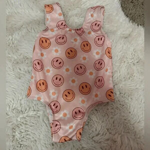 Little One Shop pink smiley one piece swimsuit 6-12 months